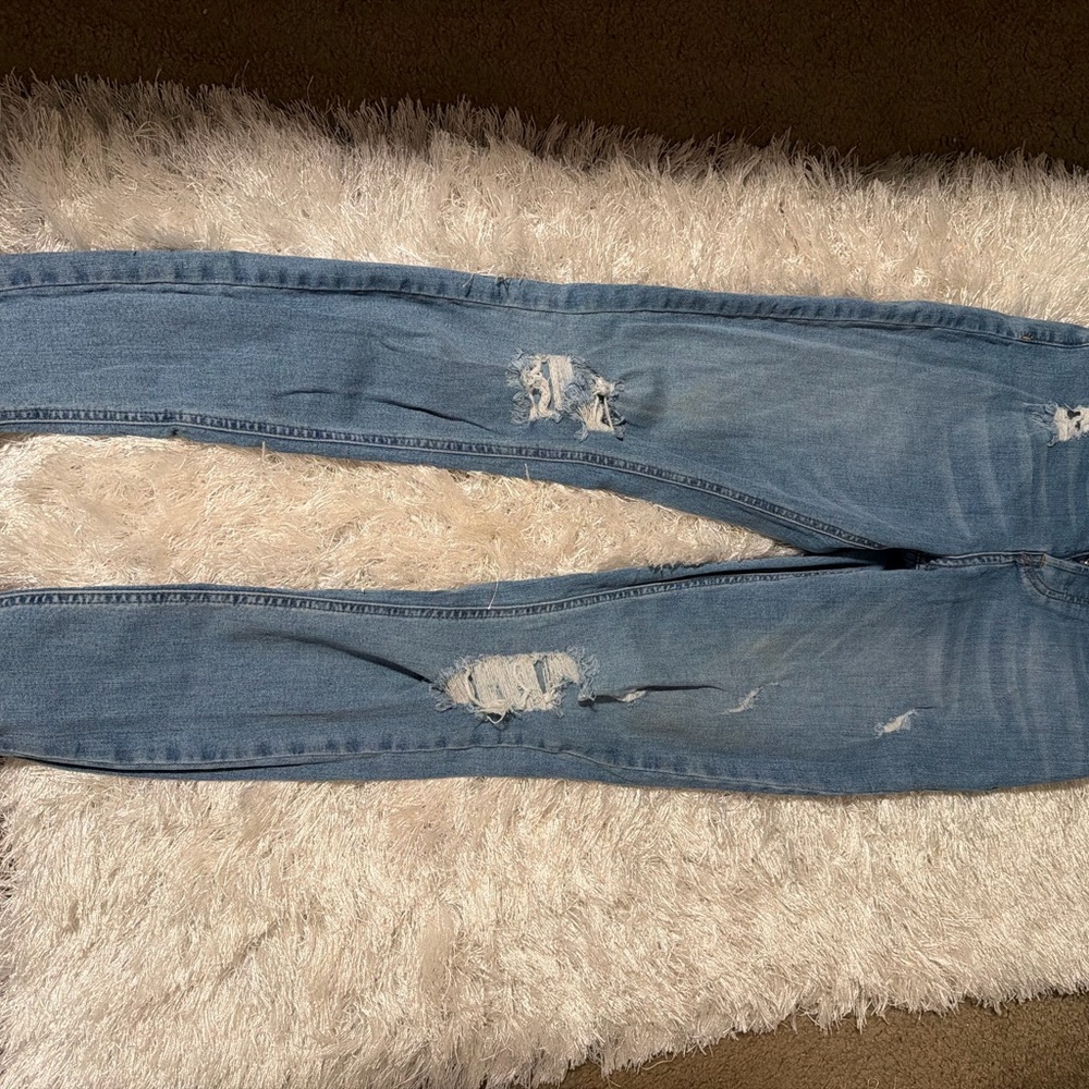 Distressed Blue Jeans